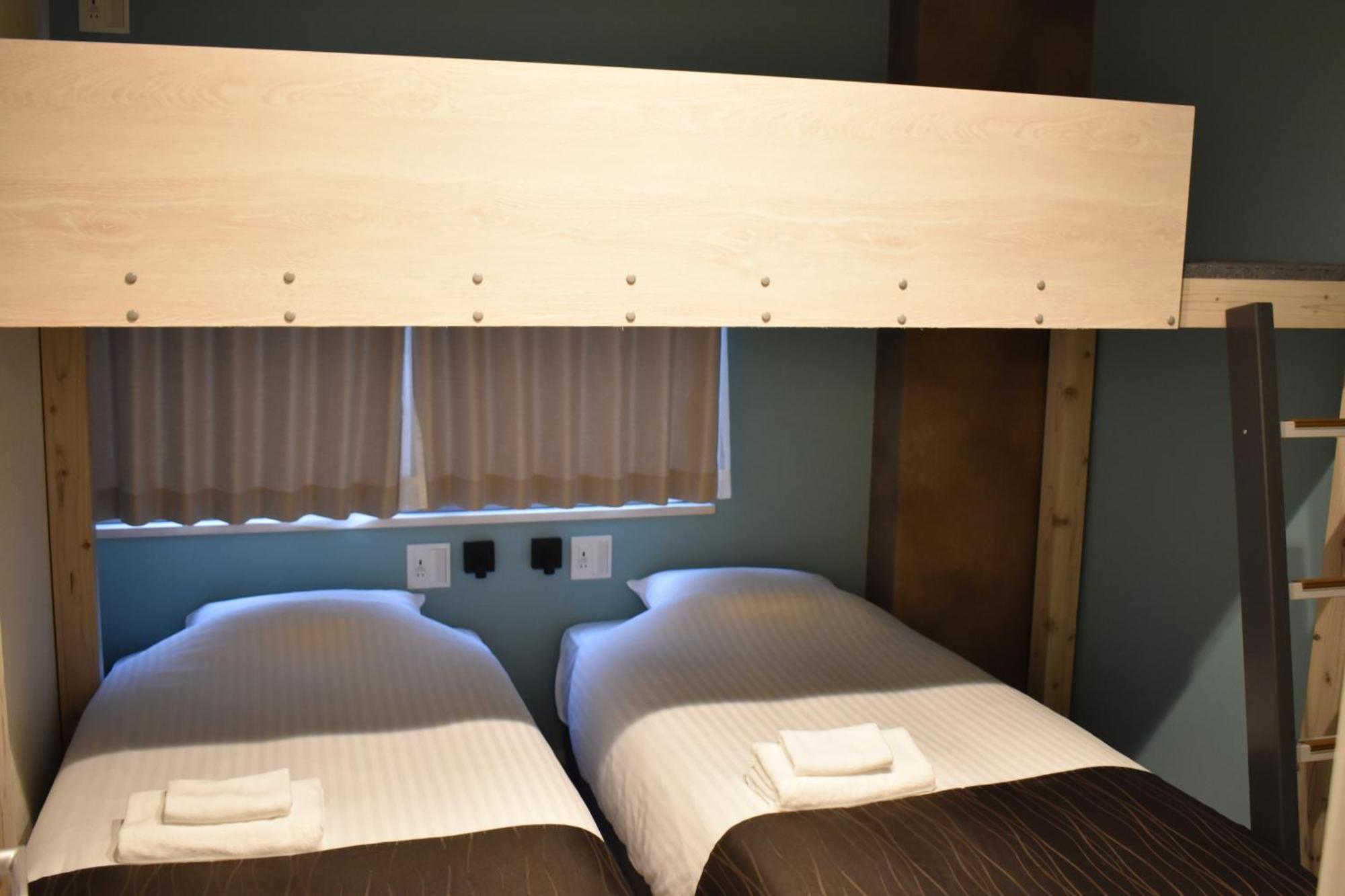 Shinsaibashi House Hotel Osaca Quarto foto