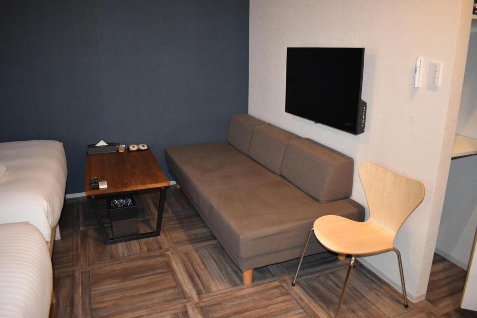 Shinsaibashi House Hotel Osaca Quarto foto