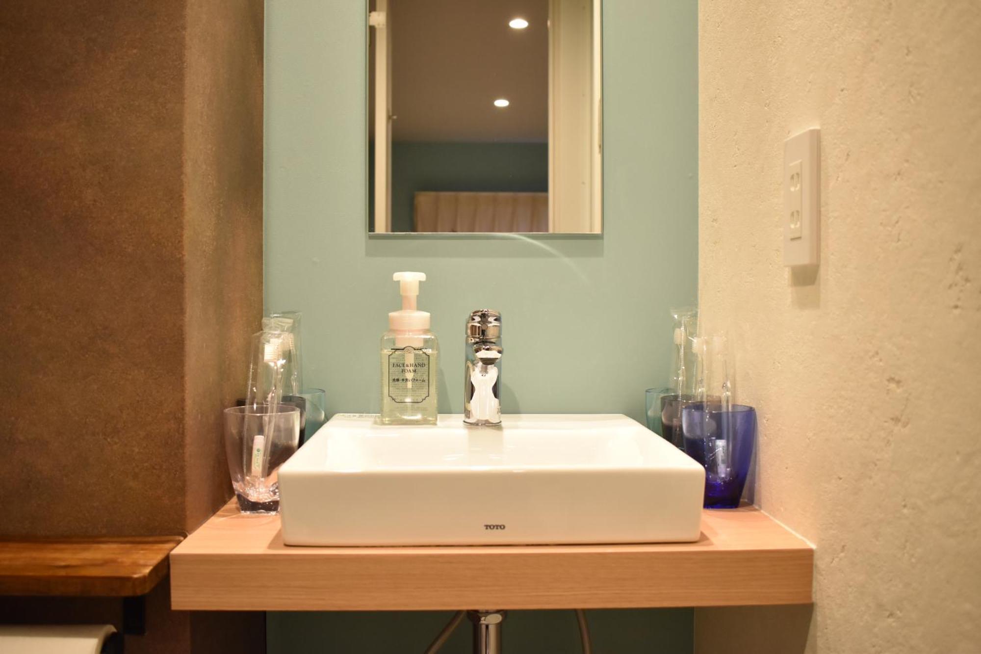 Shinsaibashi House Hotel Osaca Quarto foto