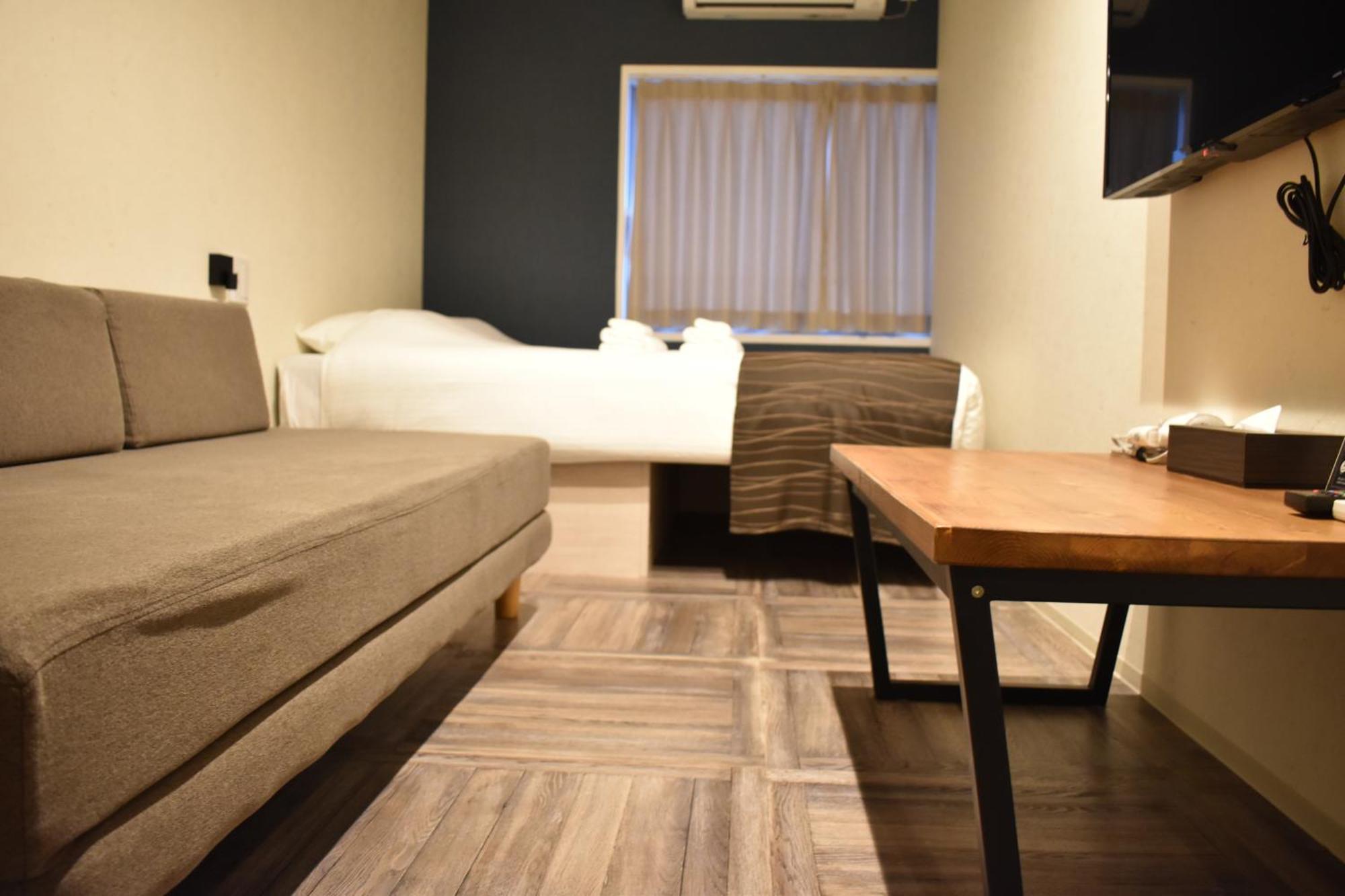Shinsaibashi House Hotel Osaca Quarto foto