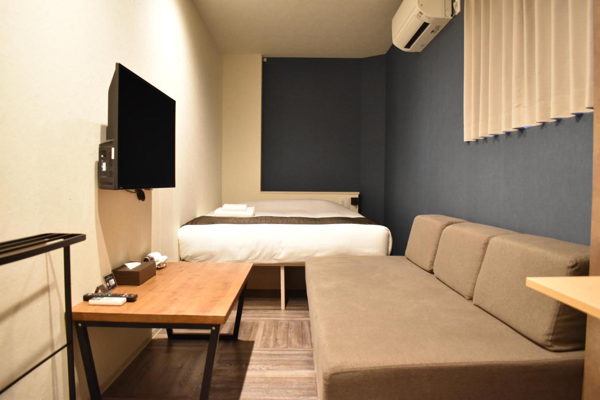 Shinsaibashi House Hotel Osaca Quarto foto