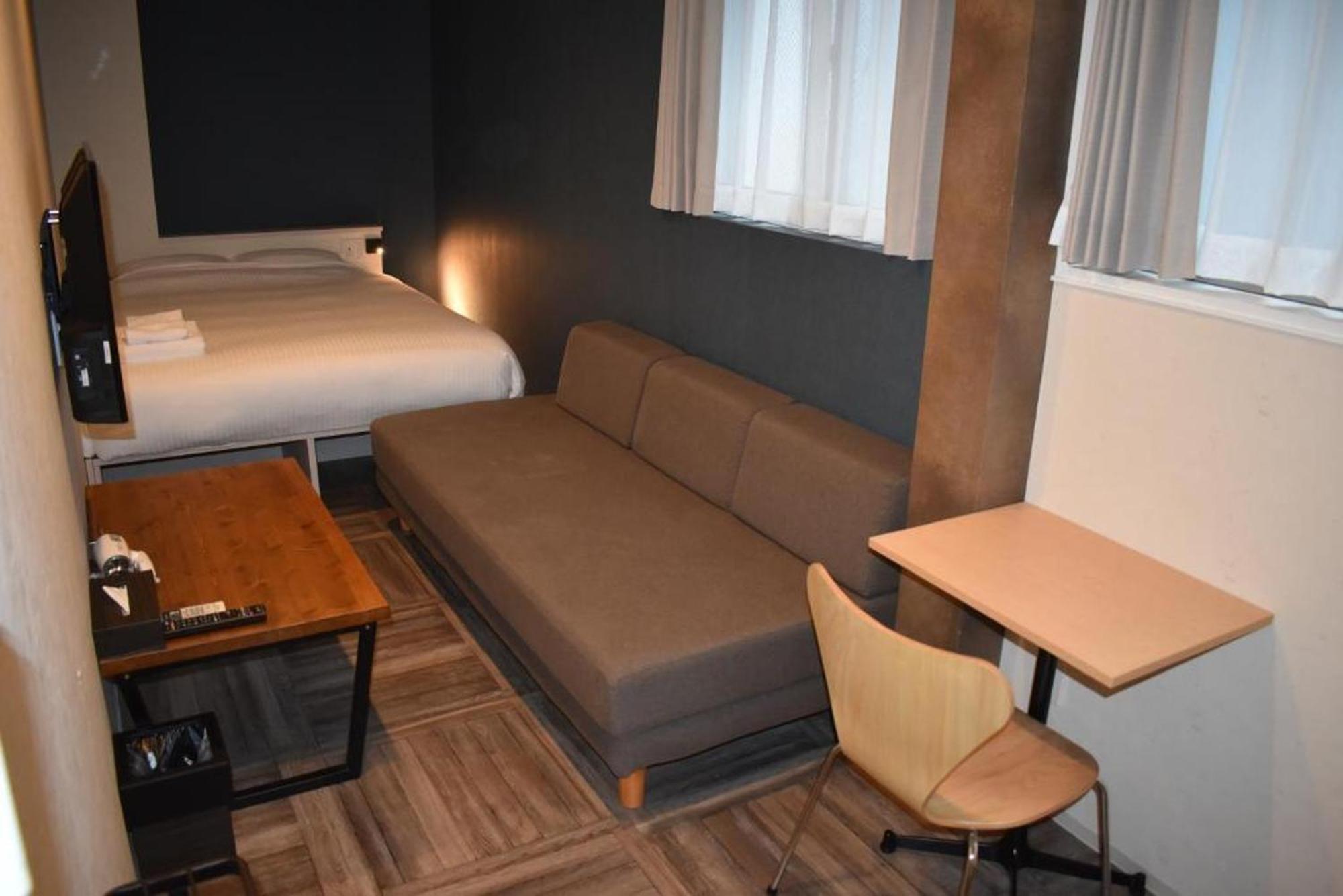 Shinsaibashi House Hotel Osaca Quarto foto
