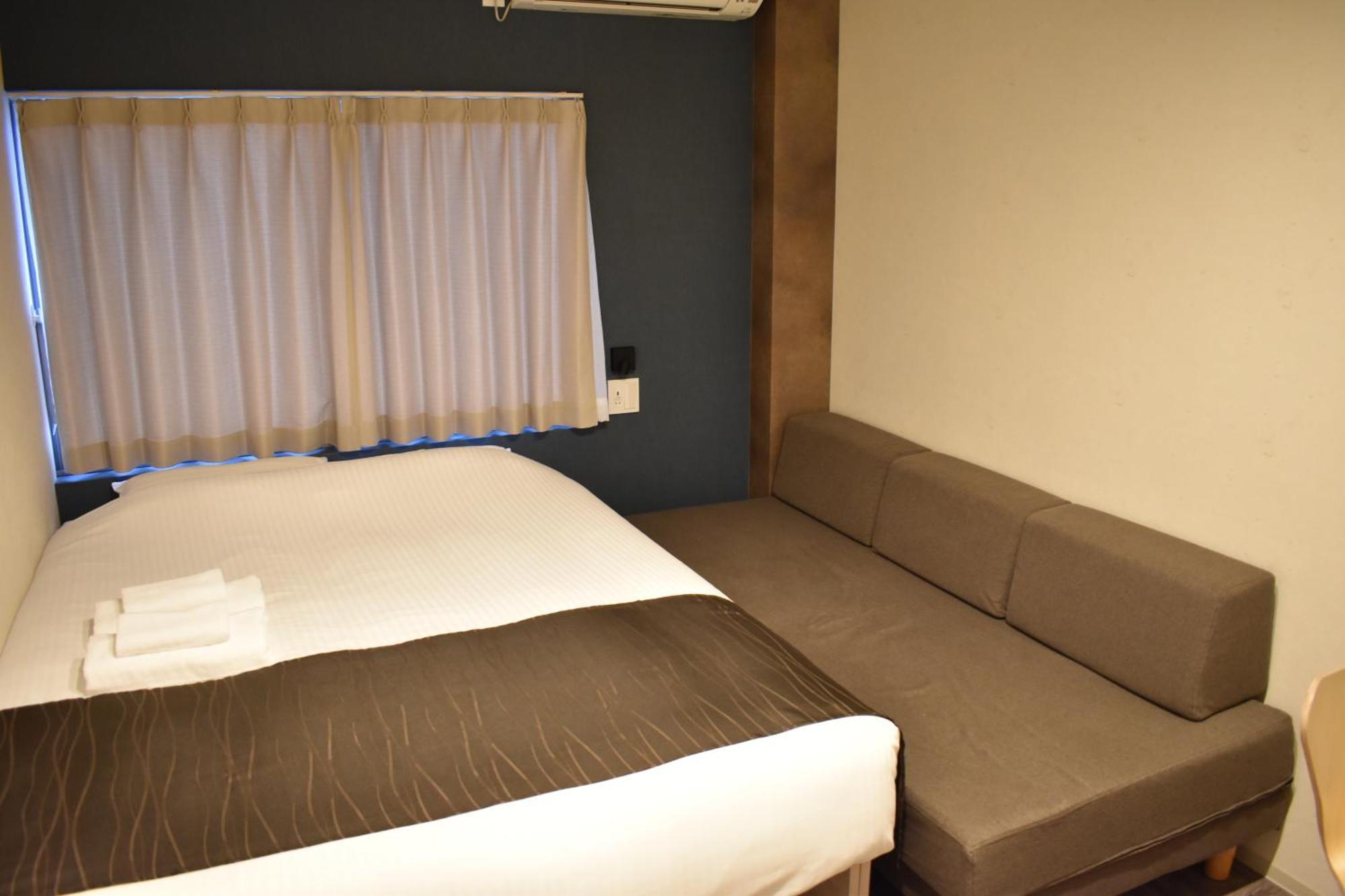 Shinsaibashi House Hotel Osaca Quarto foto