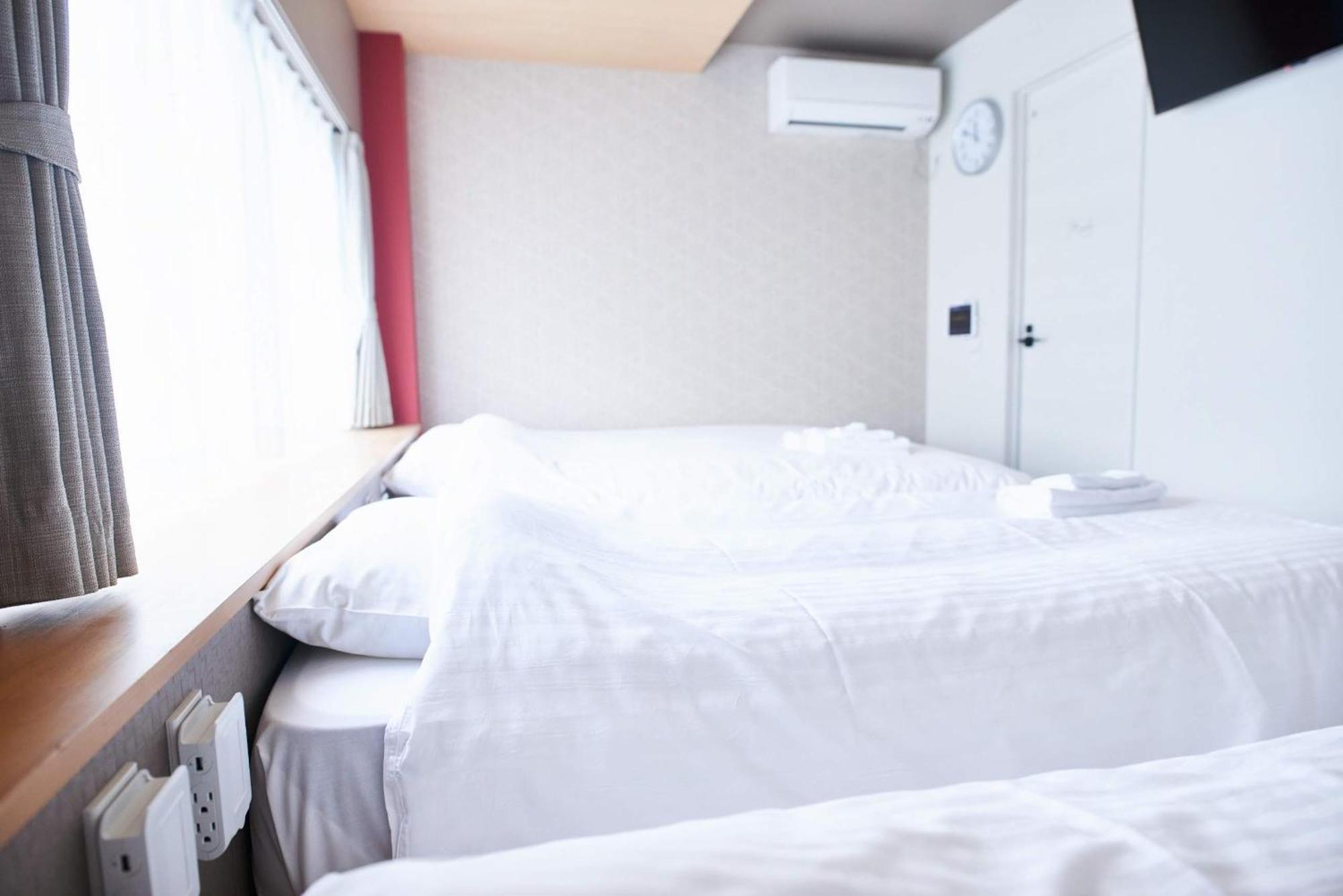 Shinsaibashi House Hotel Osaca Quarto foto