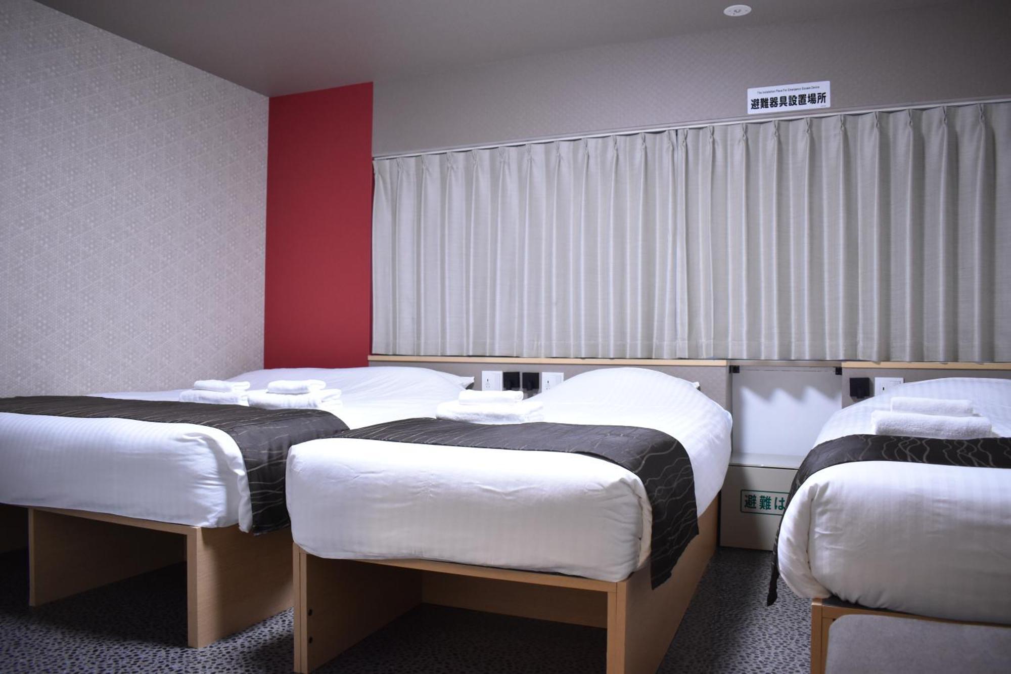 Shinsaibashi House Hotel Osaca Quarto foto