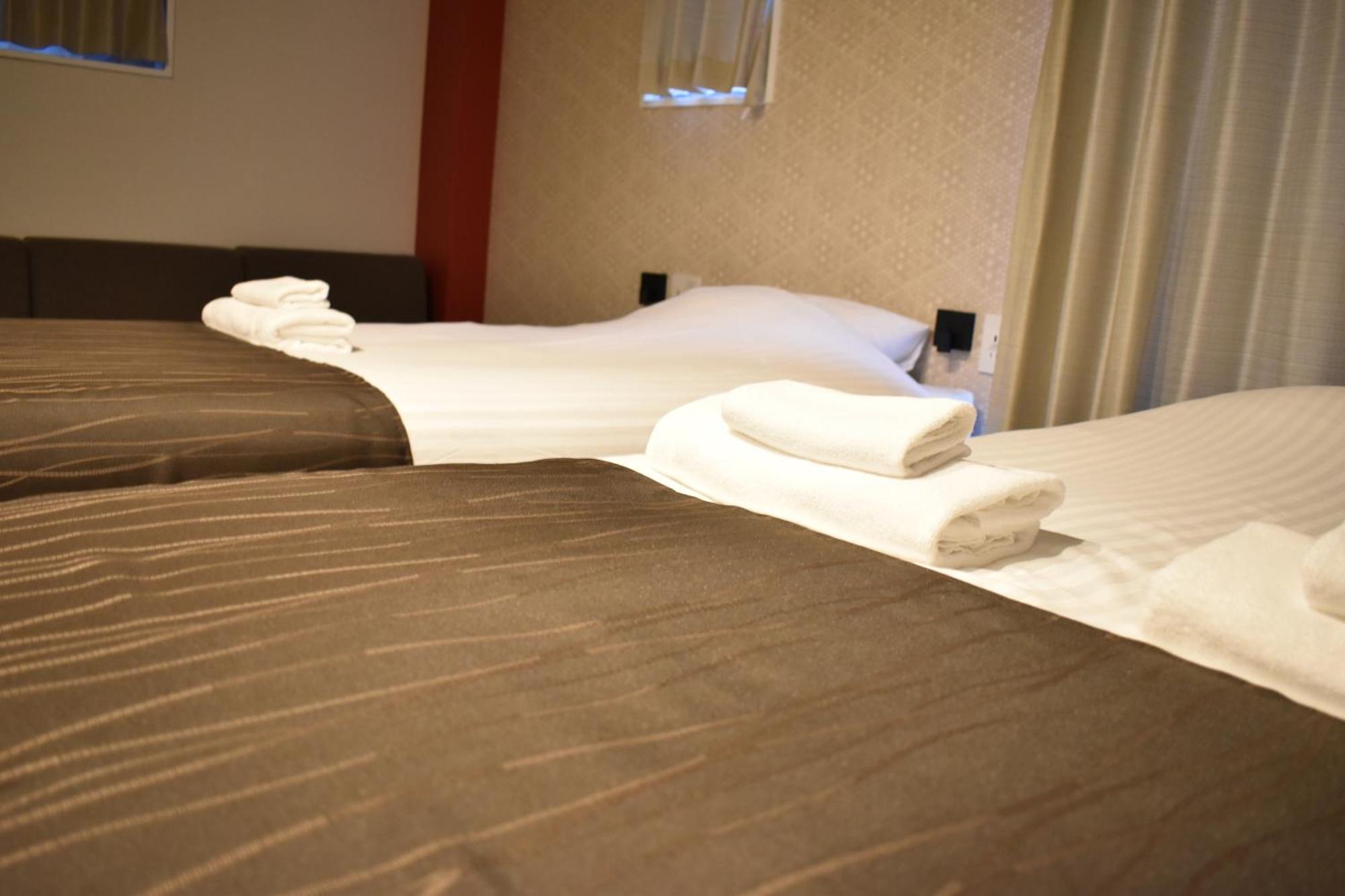 Shinsaibashi House Hotel Osaca Quarto foto