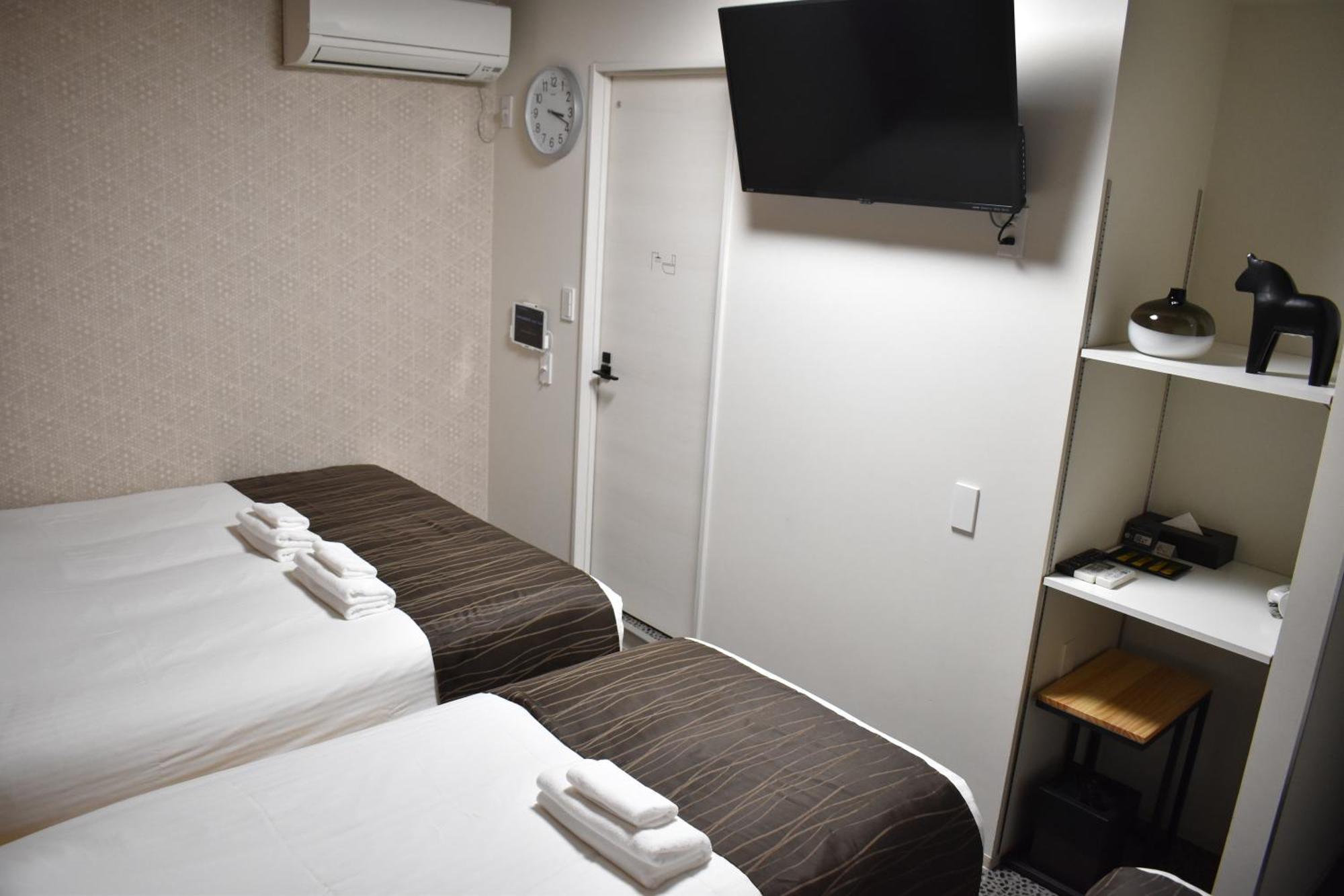 Shinsaibashi House Hotel Osaca Quarto foto