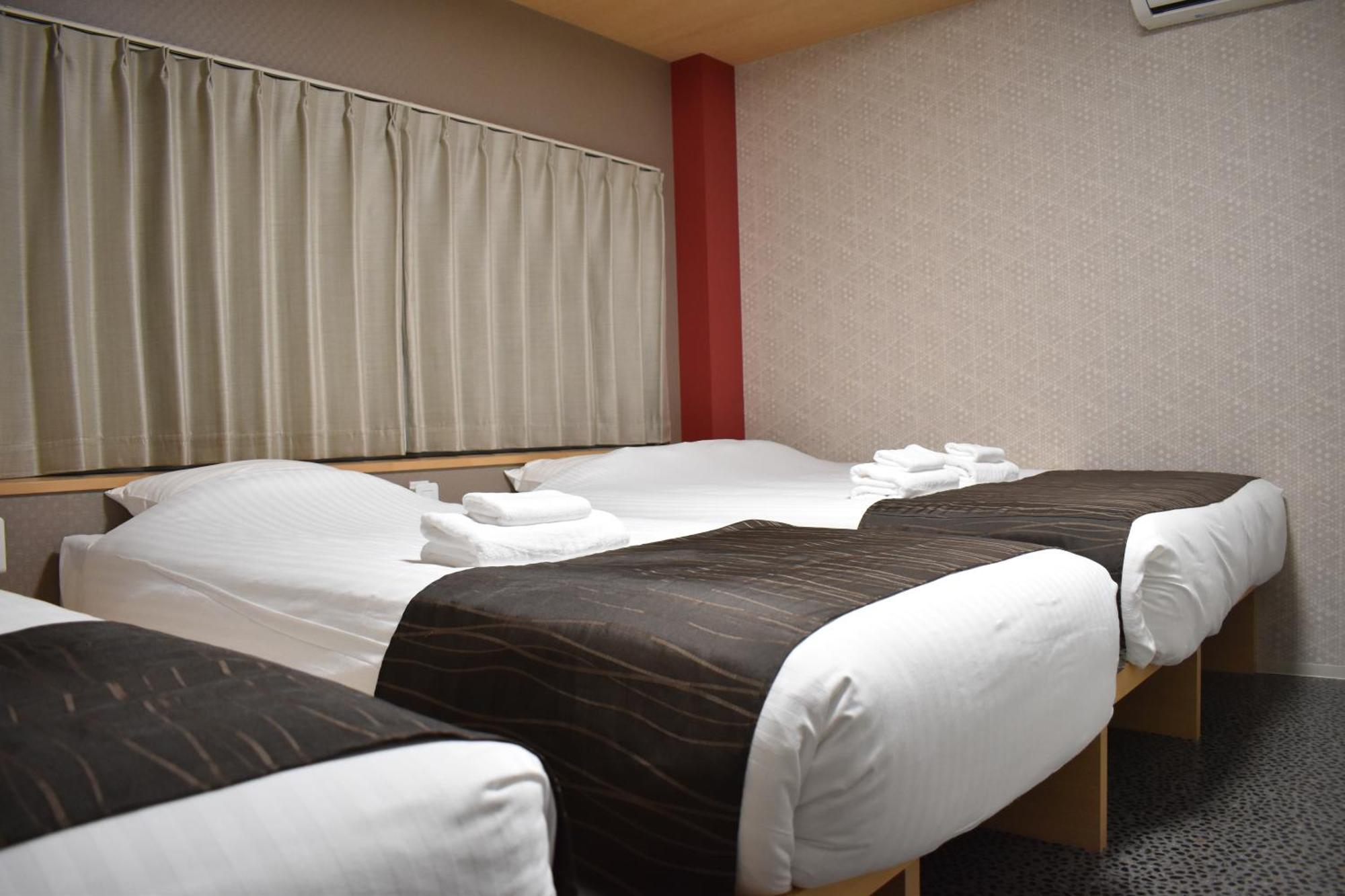 Shinsaibashi House Hotel Osaca Quarto foto