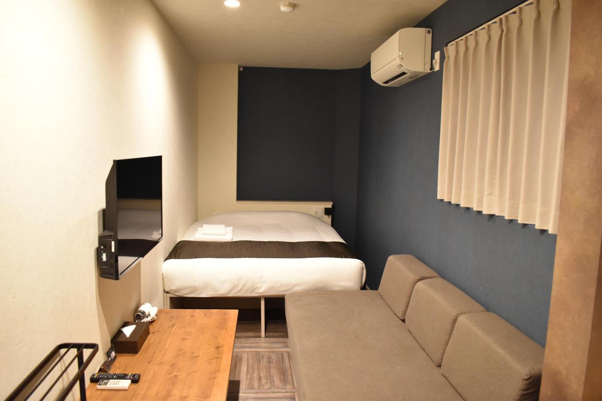 Shinsaibashi House Hotel Osaca Quarto foto