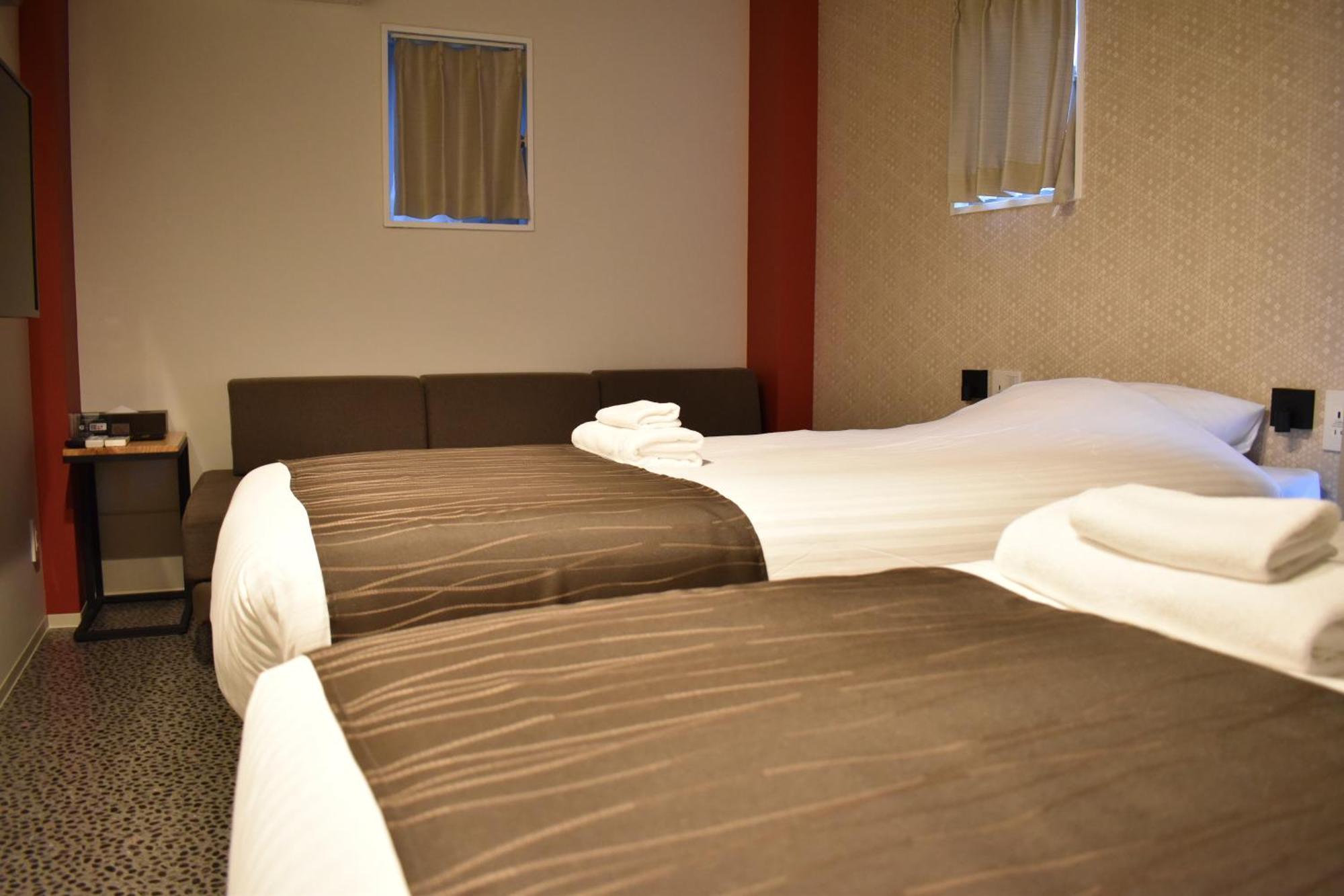 Shinsaibashi House Hotel Osaca Quarto foto