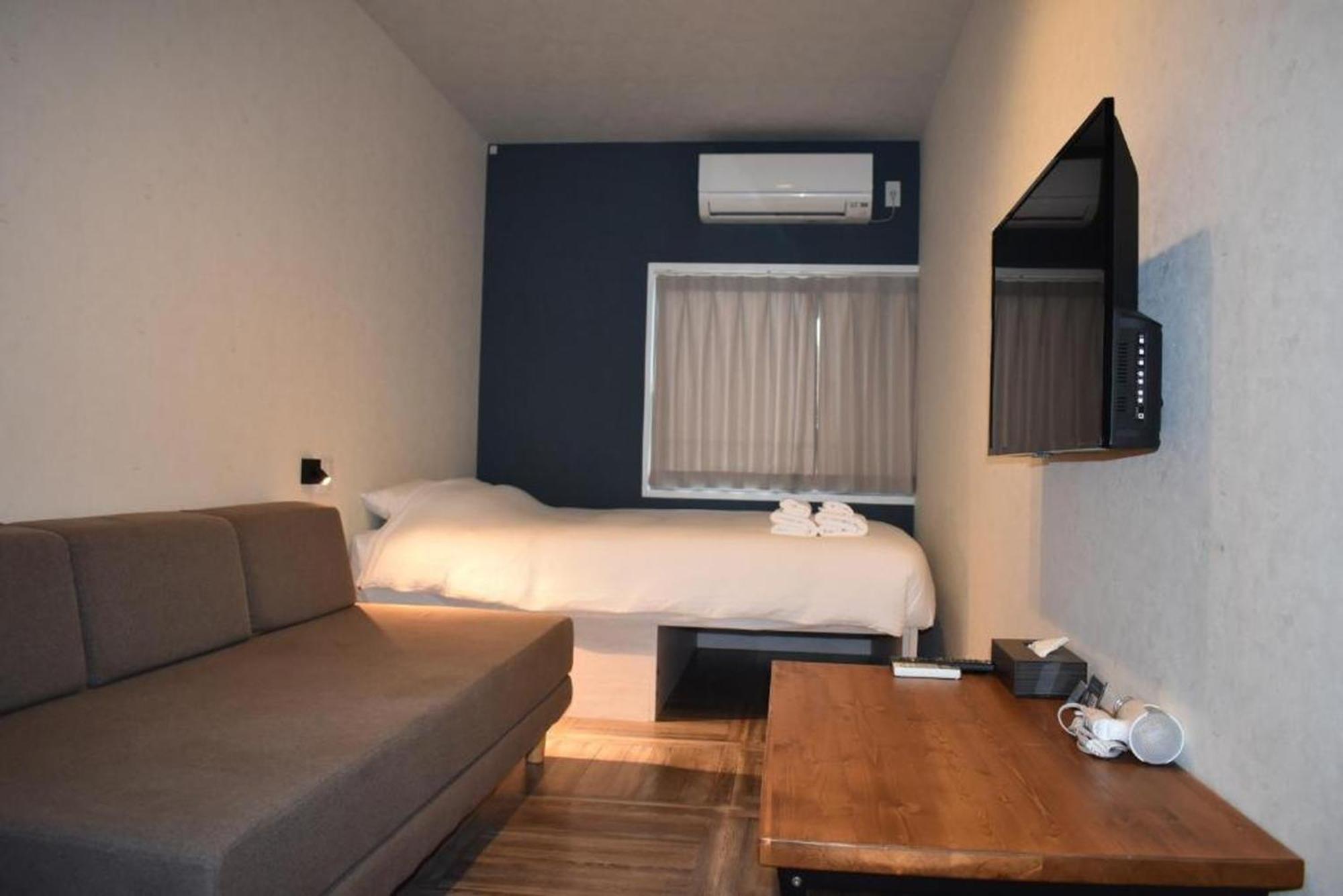 Shinsaibashi House Hotel Osaca Quarto foto